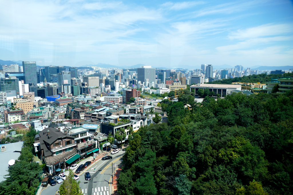 View of Seoul's northern part from the cable car's glass cabin.