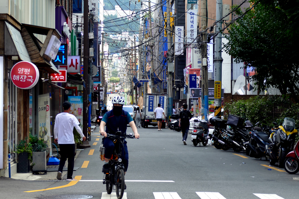 Man cycling in Busan.