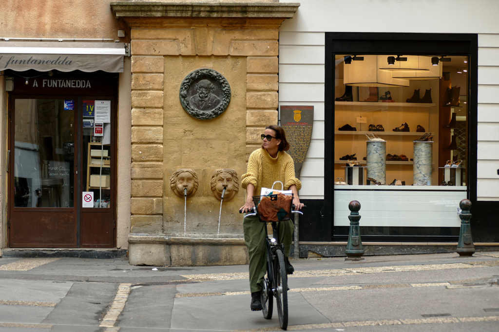Woman riding a bike in Aix-en-Provence