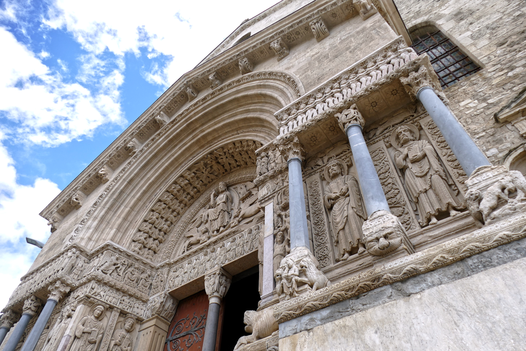 The impressive western facade of the Saint Trophime Cathedral in Arles.