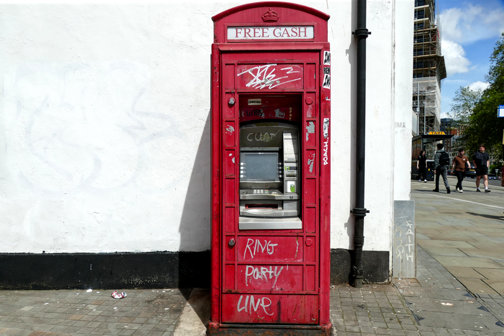 ATM in an old phone booth