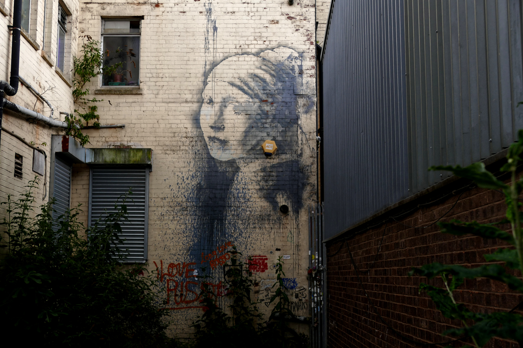 Girl with a Pierced Eardrum by Banksy