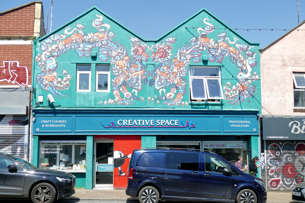 Best Street Art Bristol around North Street: Mural by Boo and Irony: Facade by Lucas Antics