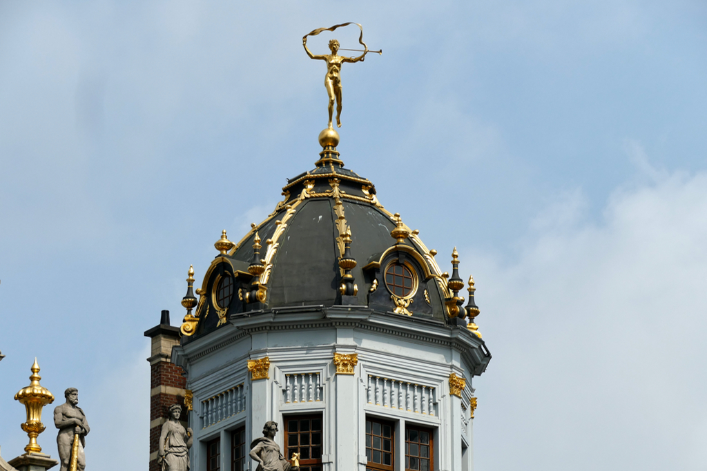 Figurine on a roof in Brussels.