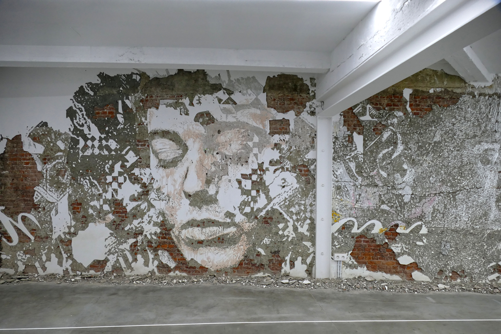 Mural by VHILS at the MIMA in Brussels.