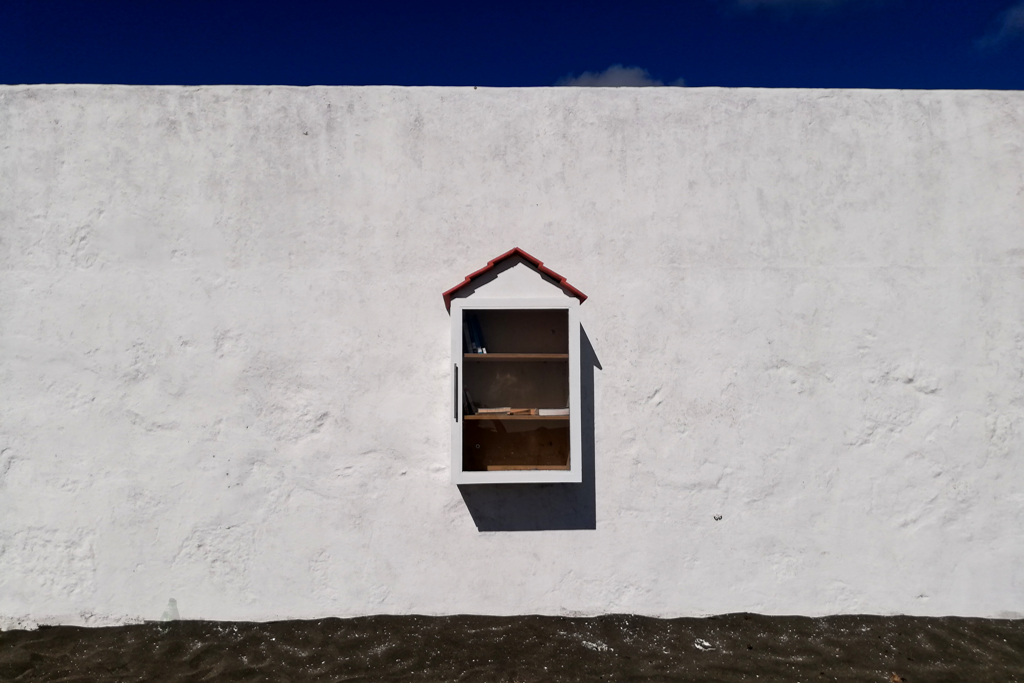 Book exchange on the beach of Praia de Sao Mateus.