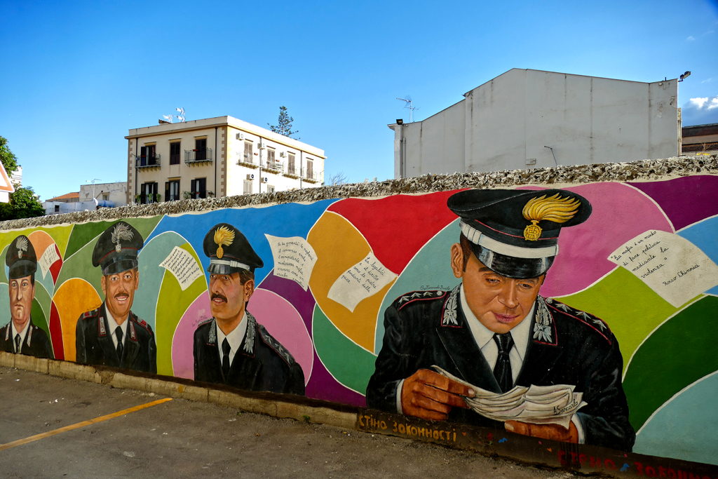 Mural of police men in Palermo.