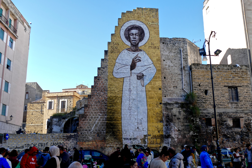 Mural of San Benedetto Il Moro in Via Flavio Andò in Palermo's Albergheria district.