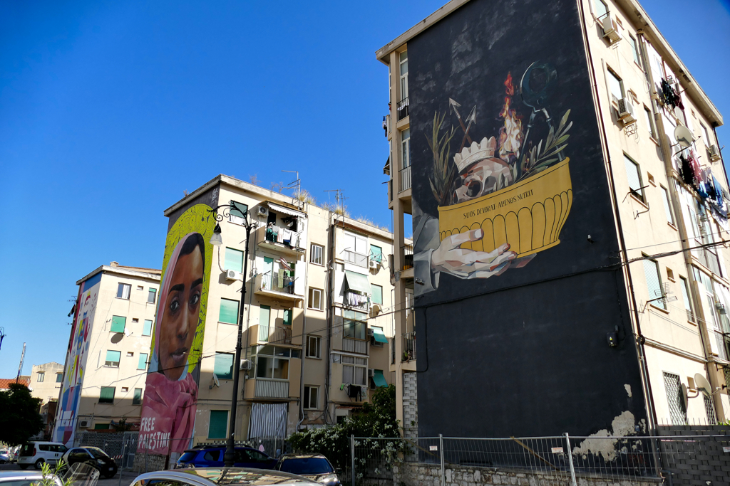 Murals alongside Kalsa's Via dello Spasimo in Palermo.