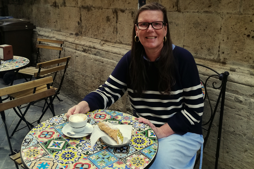 Renata Green at a café in Ortigia.