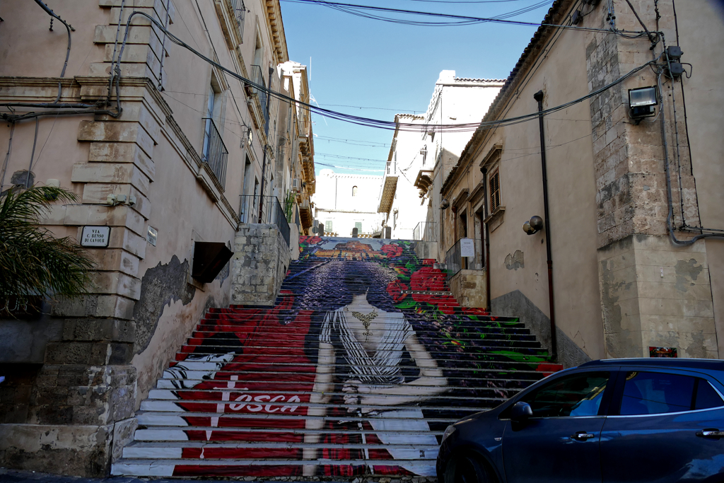 A staircase painting as a homage to Giacomo Puccini in Noto.