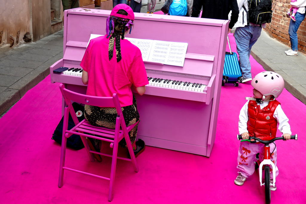 Girl playing the piano in Vilnius.