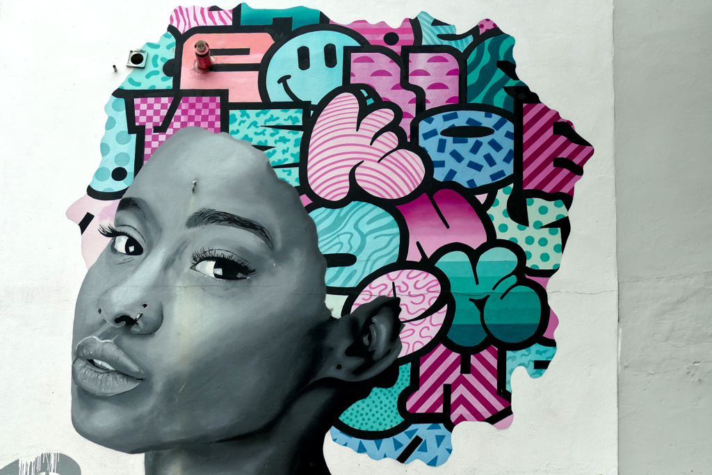 Mural by KOE ONE in Cheltenham