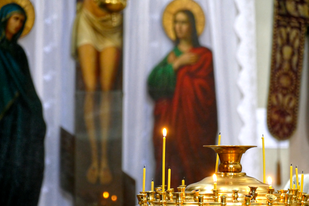 Candle burning in the Orthodox Church of the Holy Spirit.