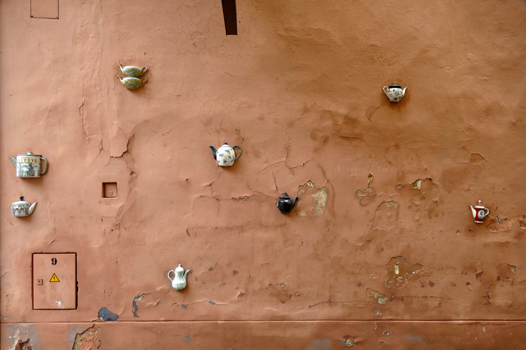 Wall at Bernardinų streets in Vilnius showing tea pots.