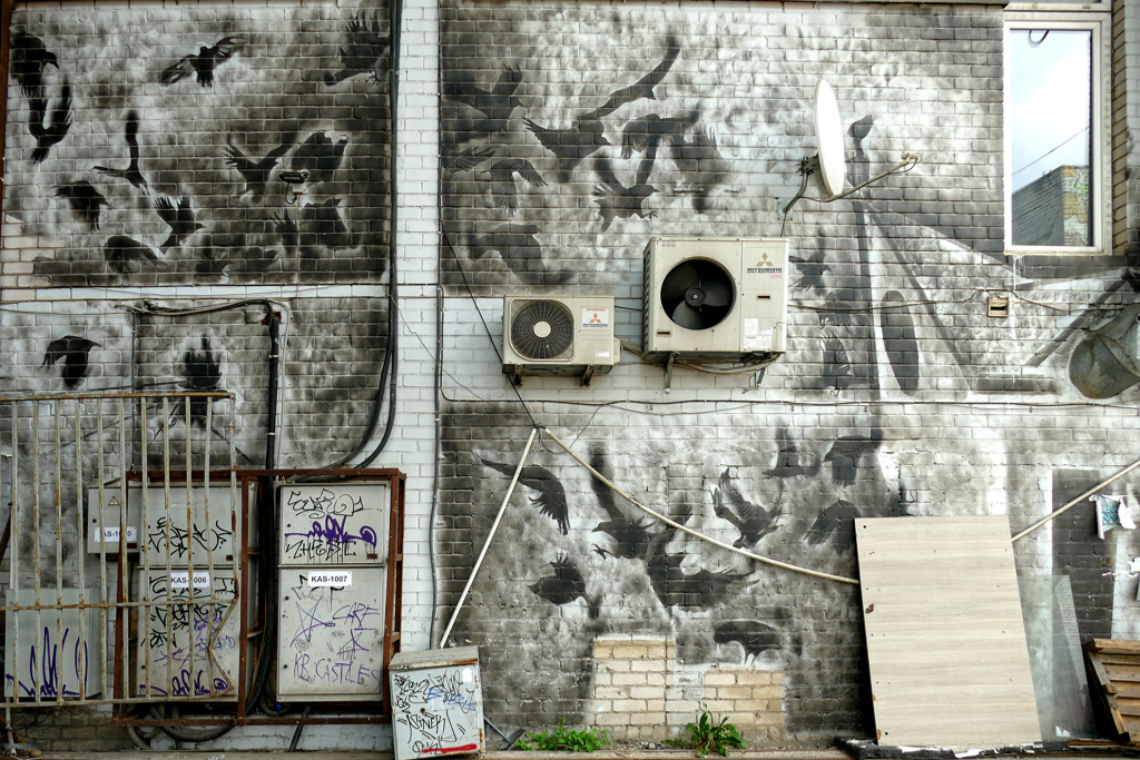 Mural by Povilas Kupčinskas, some of the best street art in Vilnius