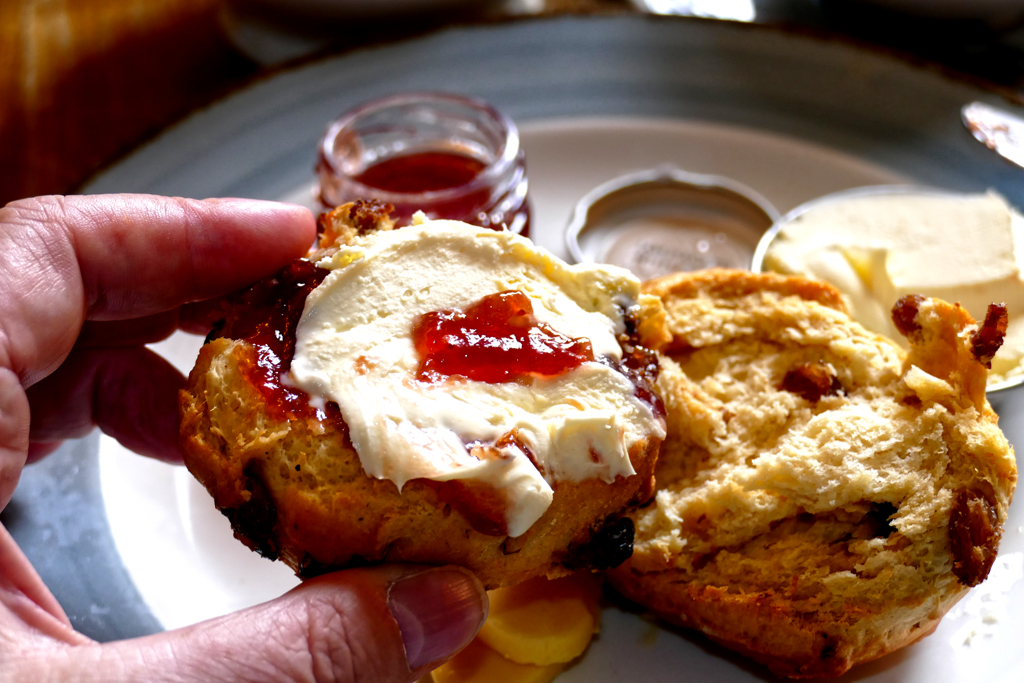 Scone with clotted cream and jam.