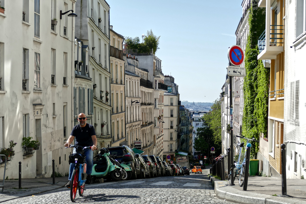 Cyclist in Montmartre in Paris.