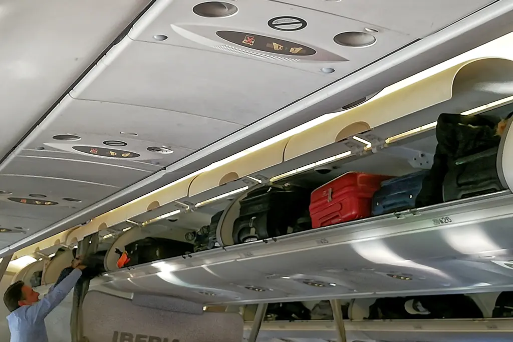 Overhead compartment in a plane.