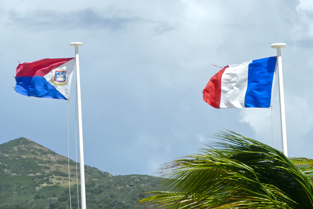 The flags of France and Sint Maarten.