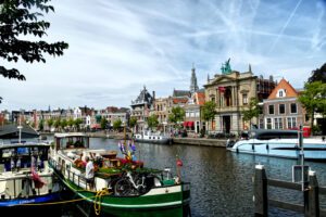View of Haarlem's river and the Teylers museum in the backdrop.
