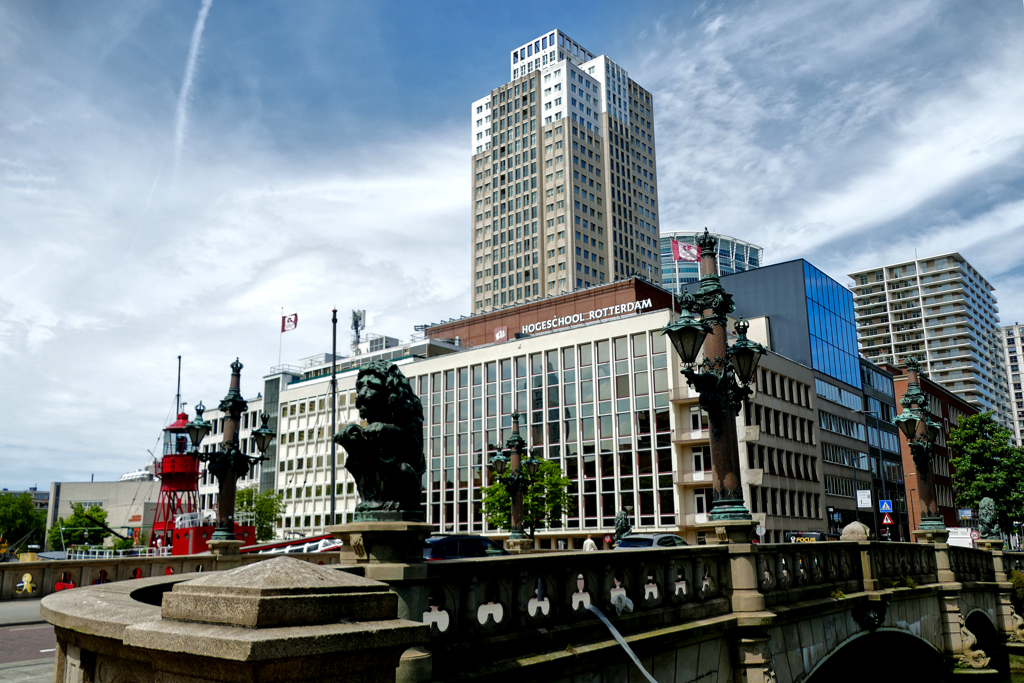 The Oude Haven Bridge, with its distinctive Art Nouveau lanterns and bronze lions, is one of Rotterdam's most photogenic historic bridges and forms a beautiful contrast to the modern skyline in the background.