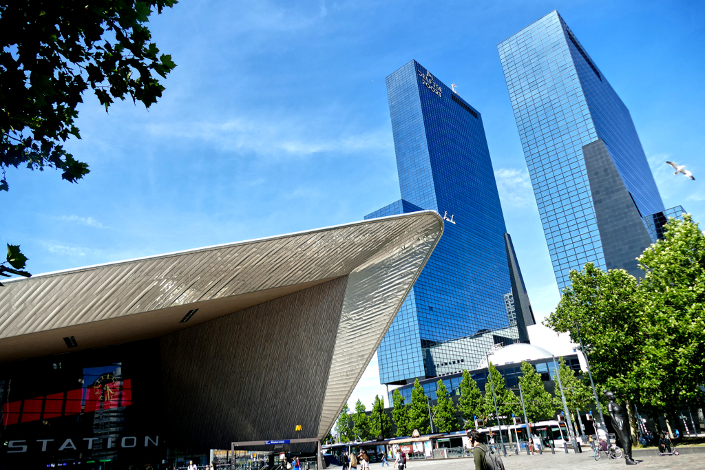 Rotterdam Centraal station with the iconic Delftse Poort twin towers by Abe Bonnema.