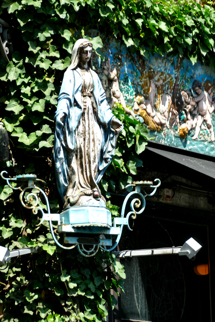 Madonna figure on the corner of a house in Antwerp.