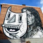 Beauty beneath the Mask is a large mural created by Nils Westergard and Joachim Lambrechts in May 2017.