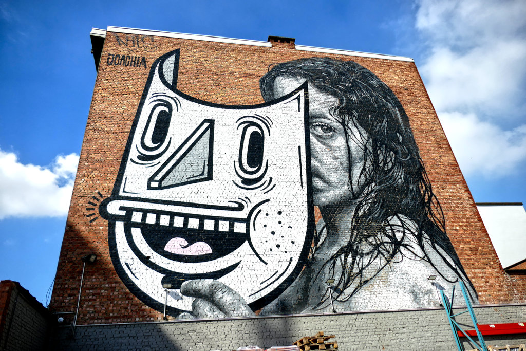 Beauty beneath the Mask is a large mural created by Nils Westergard and Joachim Lambrechts in May 2017.