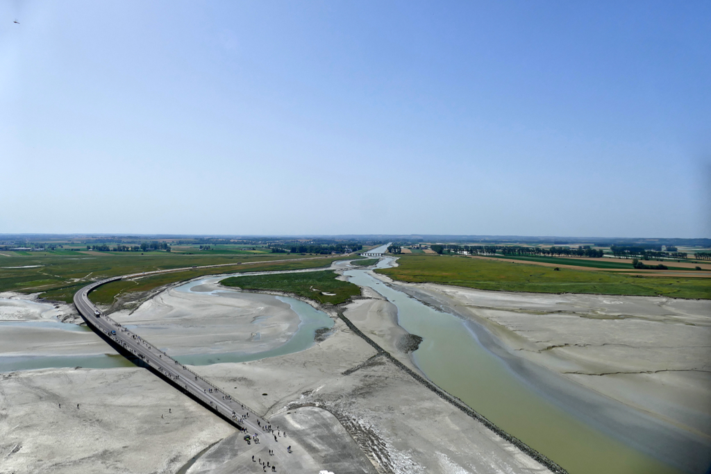 Here you can see the scenery around the mount including the stilt bridge Pont-Passerelle du Mont-Saint-Michel to the left.