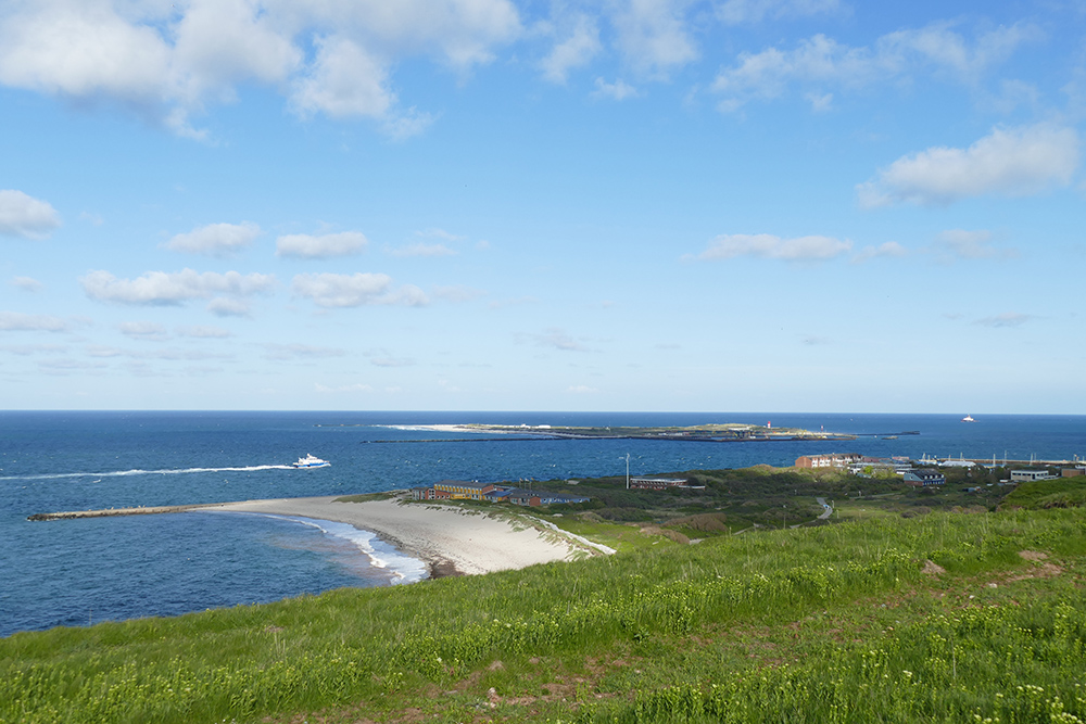 The northern beach of the main island and in the backdrop the isle of Düne - which translates to Dune and consists of beautiful sandy beaches.